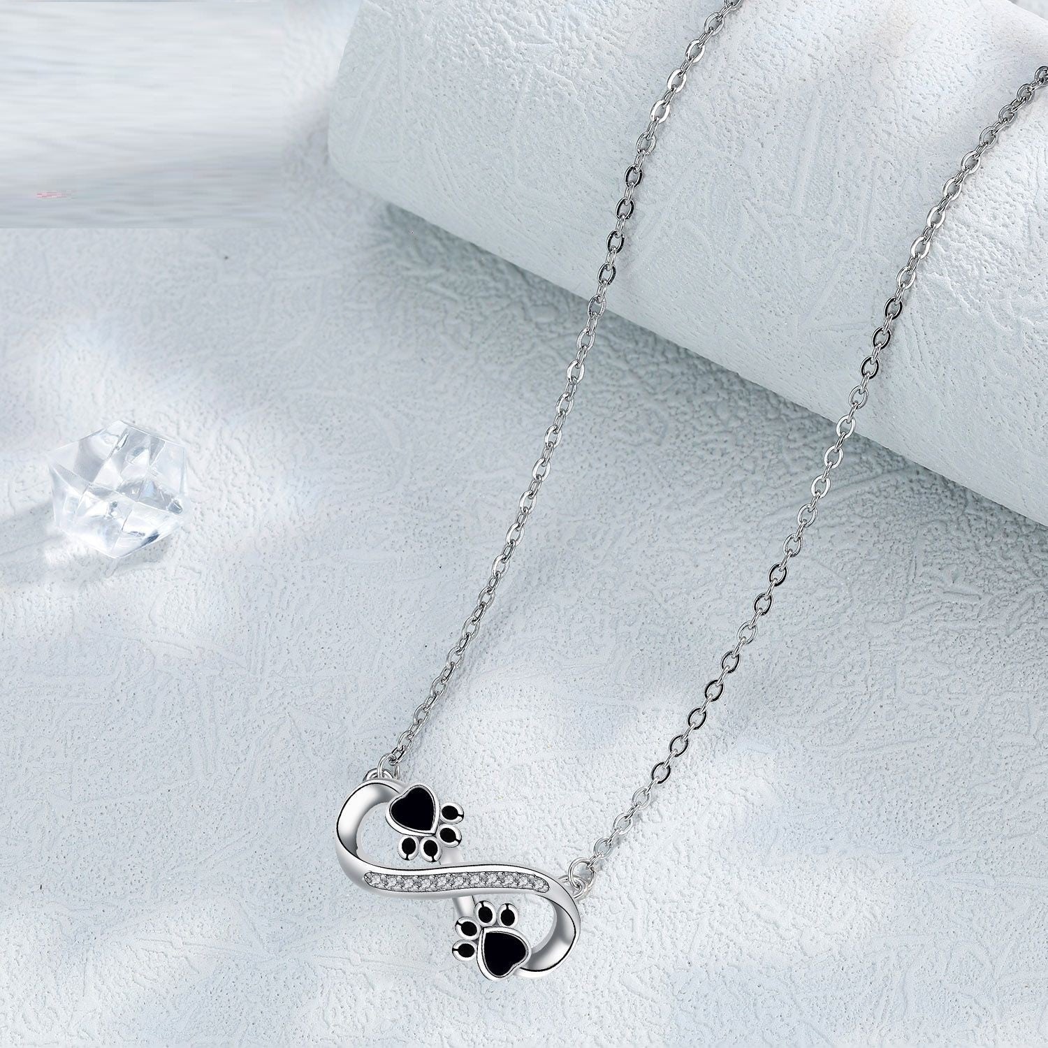 Collana con impronta di zampa infinito con zirconia, immagine 2 - Emma e Gemma