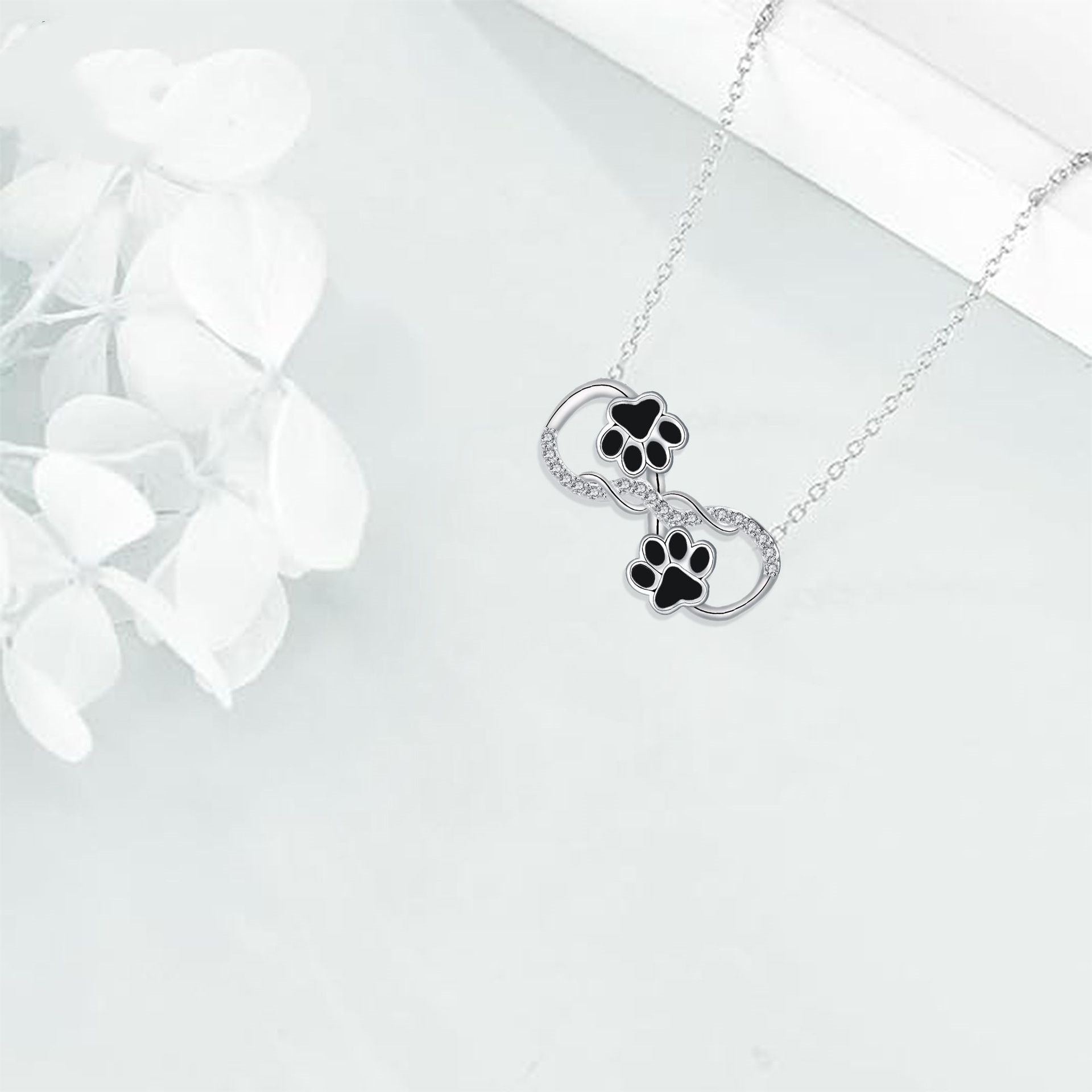 Collana con pendente a simbolo dell'infinito con zirconia, immagine 3 - Emma e Gemma