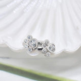 Orecchini Huggie a forma di zampa con Zirconia scintillante, immagine 2 - Emma e Gemma