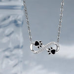 Collana con impronta di zampa infinito con zirconia - Emma e Gemma
