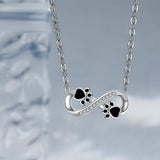 Collana con impronta di zampa infinito con zirconia - Emma e Gemma