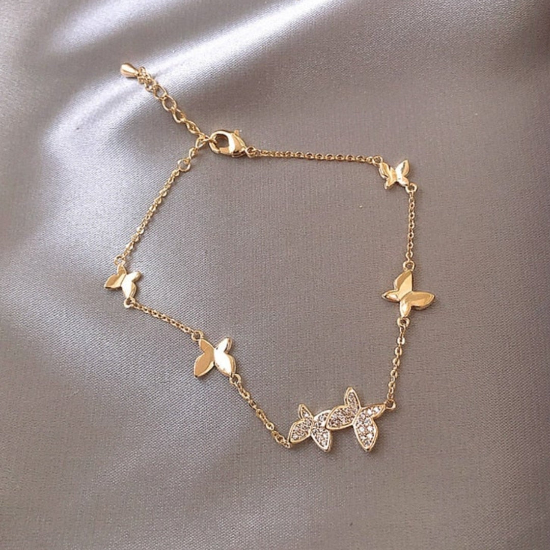Bracciale a Farfalla Regolabile con Zirconia in Oro - Emma e Gemma