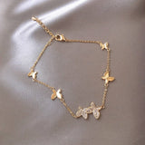 Bracciale a Farfalla Regolabile con Zirconia in Oro - Emma e Gemma