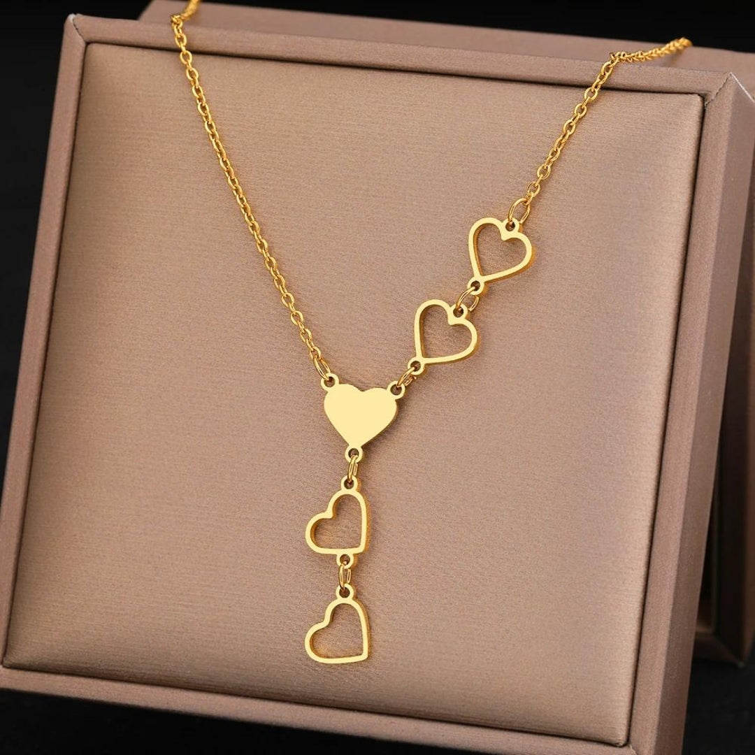 Collana a forma di cuore in oro e argento - Emma e Gemma