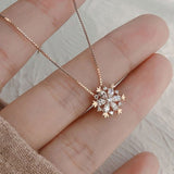 Collana di Cristallo a Fiocco di Neve Glitterato in Oro e Argento - Emma e Gemma