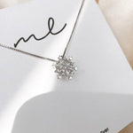 Collana di Cristallo a Fiocco di Neve Glitterato in Oro e Argento, immagine 4 - Emma e Gemma