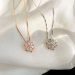 Collana di Cristallo a Fiocco di Neve Glitterato in Oro e Argento, immagine 2 - Emma e Gemma