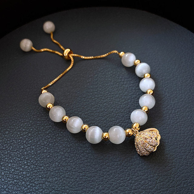 Bracciale a Conchiglia con Perle in Oro - Emma e Gemma