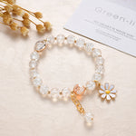 Bracciale in Oro con Pietre Bianche e Fiore di Margherita - Emma e Gemma