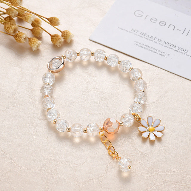 Bracciale in Oro con Pietre Bianche e Fiore di Margherita - Emma e Gemma