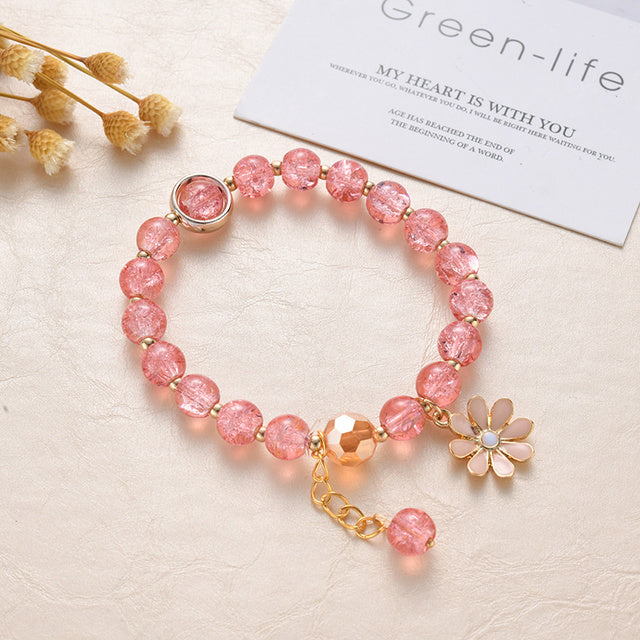 Bracciale con Pietre Rosse e Fiore di Margherita in Oro - Emma e Gemma