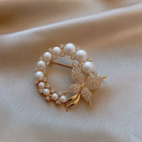 Spilla Vintage a Forma di Farfalla con Perle e Diamanti in Oro - Emma e Gemma