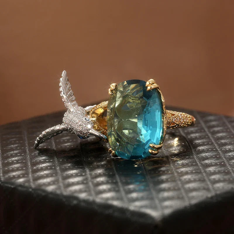 Anello Regolabile Colore Acquamarina con Colibrì – Placcato Oro 14K, immagine 3 - Emma e Gemma