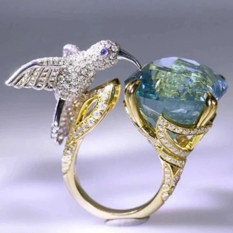 Anello Regolabile Colore Acquamarina con Colibrì – Placcato Oro 14K - Emma e Gemma
