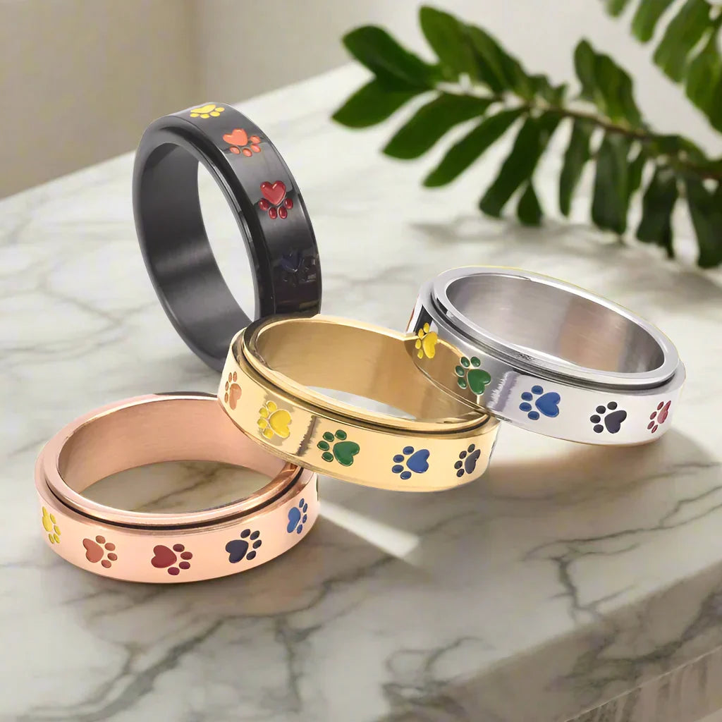 Anello Antistress Rotante – Acciaio Inossidabile con Zampe Arcobaleno - Kaja i Maja