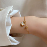 Bracciale Amore con Opale Bianco in Oro - Emma e Gemma