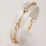 Bracciale elegante con zirconie in oro - Emma e Gemma