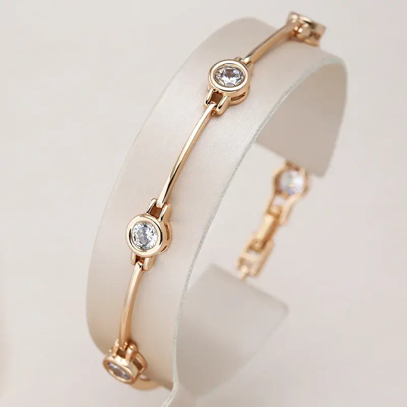 Bracciale elegante con zirconie in oro - Emma e Gemma