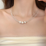 Collana a strati in perle bianche eleganti - Emma e Gemma