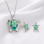 Collana e orecchini tartaruga marina in opale viola e argento