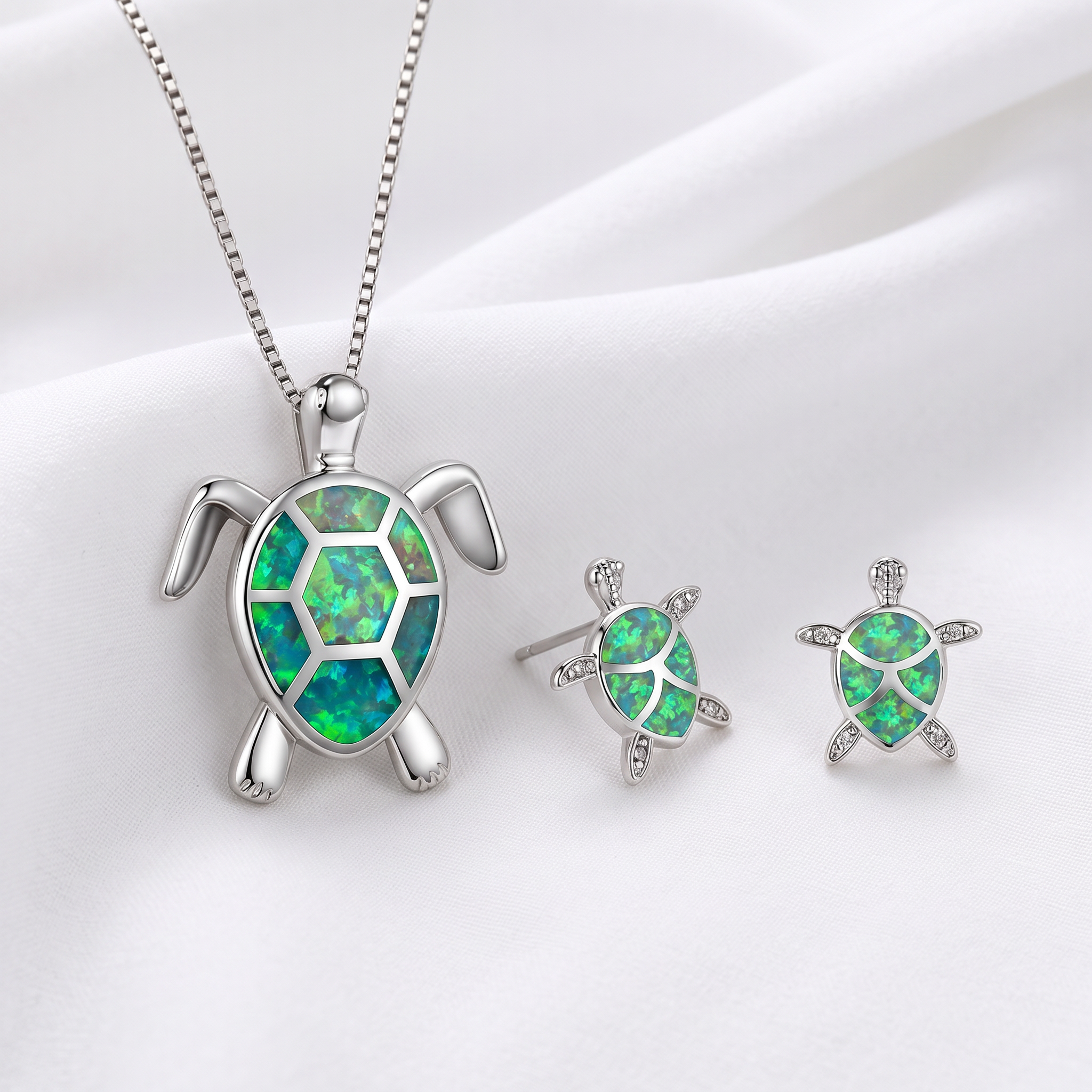 Collana e orecchini tartaruga marina in opale viola e argento