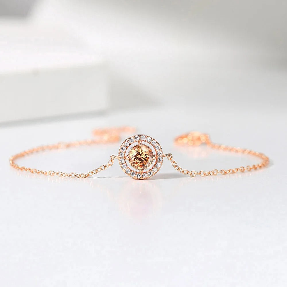 Bracciale Classico in Oro Rosa Rotondo con Gemma Arancione e Bordo Scintillante - Emma e Gemma