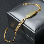 Bracciale Classico in Oro con Gemma Verde e Accenti in Filigrana Floreale - Emma e Gemma