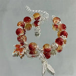 Bracciale in Argento con Foglia d'Autunno e Farfalla - Emma e Gemma