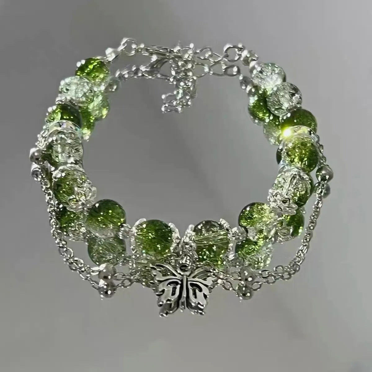Bracciale Vintage in Argento con Farfalla e Perle Verdi - Emma e Gemma