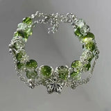 Bracciale Vintage in Argento con Farfalla e Perle Verdi - Emma e Gemma