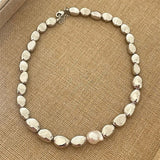 Collana a forma di goccia d'argento retro con perle e perline - Emma e Gemma