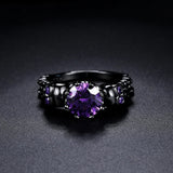 Anello Vintage Nero con Gemma Viola e Design Intricato - Emma e Gemma