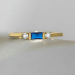Anello Oro Stupefacente con Centro Blu e Brillante - Emma e Gemma