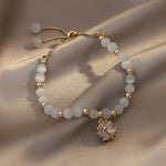 Bracciale con Pendente in Oro Bianco e Perline di Cristallo - Emma e Gemma