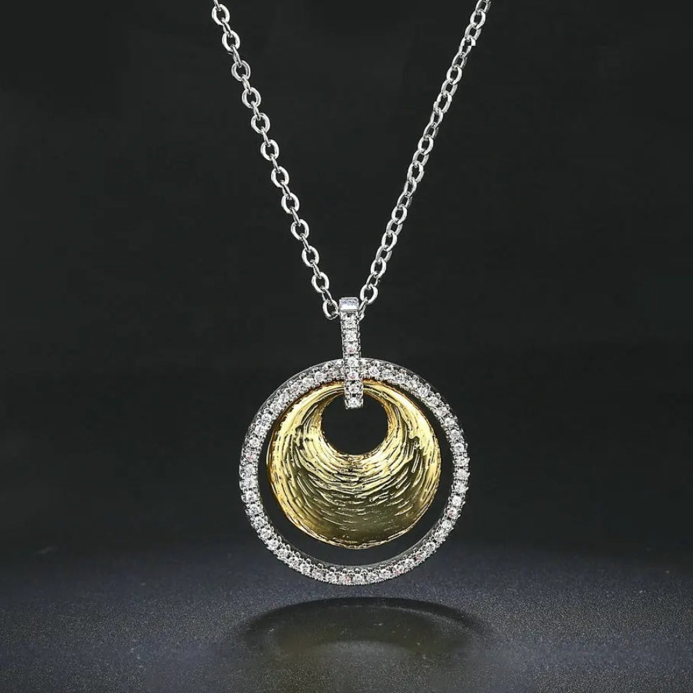 Collana Vintage in Argento e Oro con Design a Vortice - Emma e Gemma