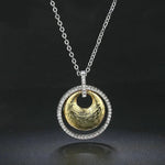 Collana Vintage in Argento e Oro con Design a Vortice - Emma e Gemma
