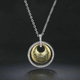 Collana Vintage in Argento e Oro con Design a Vortice - Emma e Gemma