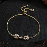 Bracciale Regolabile con Foglia Floreale Dorata - Emma e Gemma