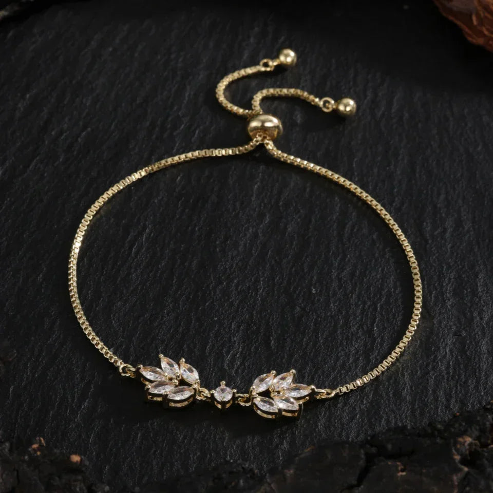 Bracciale Regolabile con Foglia Floreale Dorata - Emma e Gemma