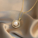 Collana con pendente a perla in oro intrecciato - Emma e Gemma